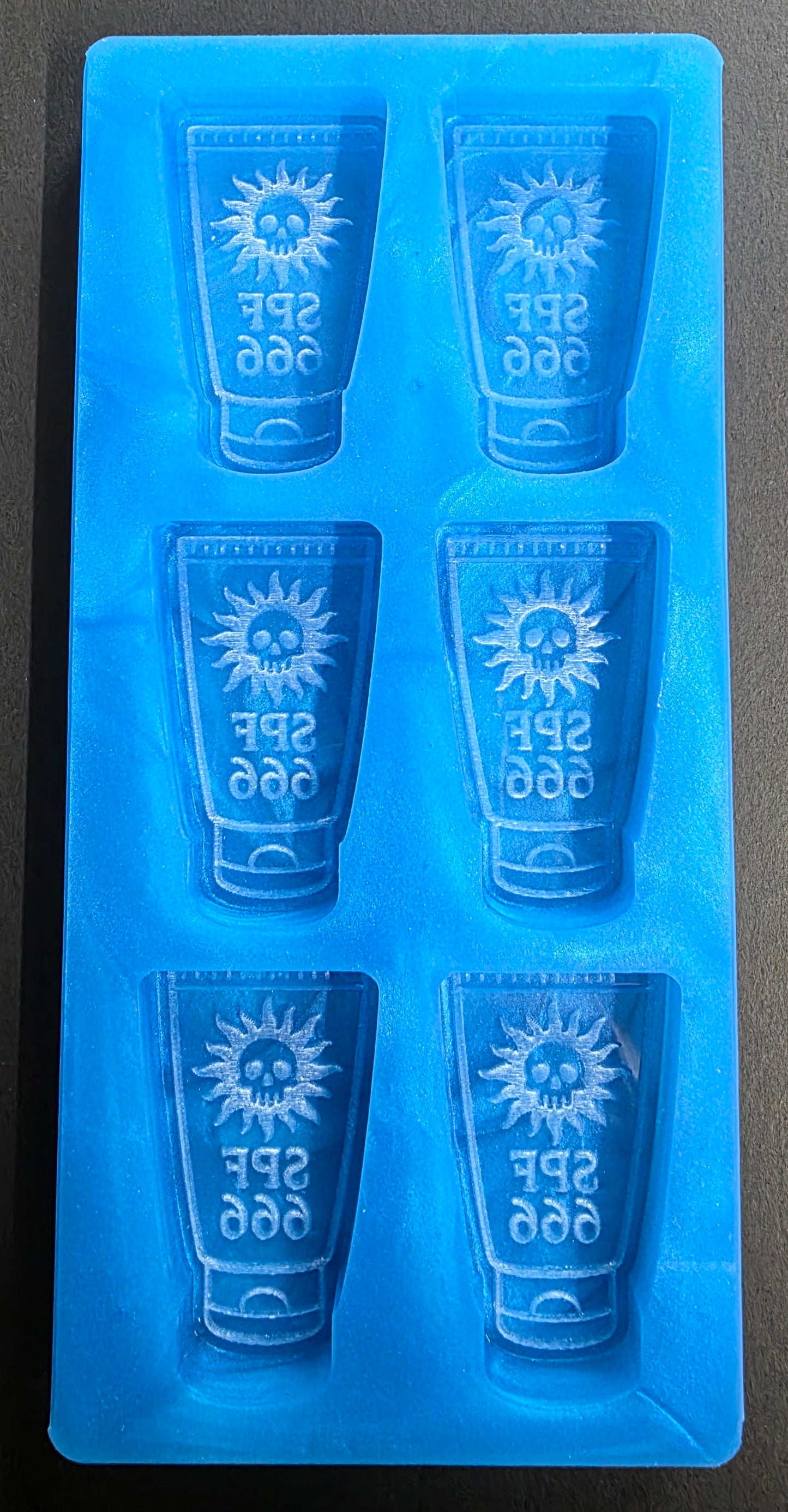 SPF 666 Spooky Suncream 6 cell silicone mould for wax, soap, resin, jesmonite etc