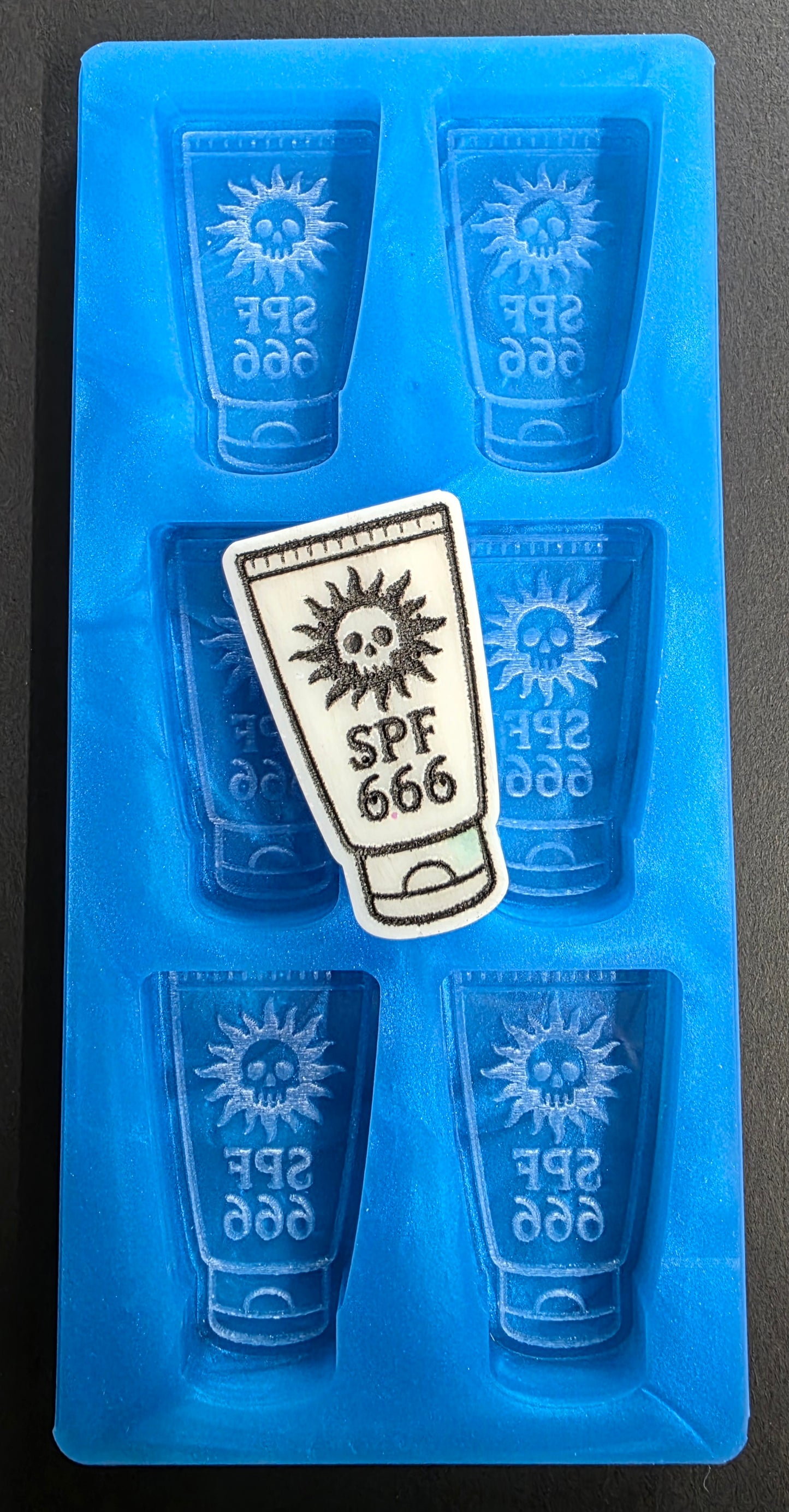 SPF 666 Spooky Suncream 6 cell silicone mould for wax, soap, resin, jesmonite etc